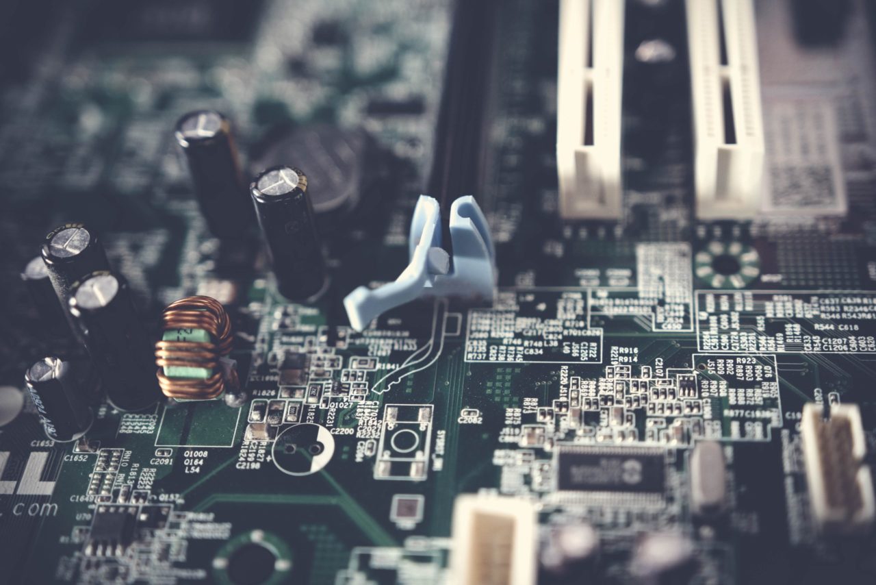 tilt-shift-photography-of-motherboard - deyco consulting